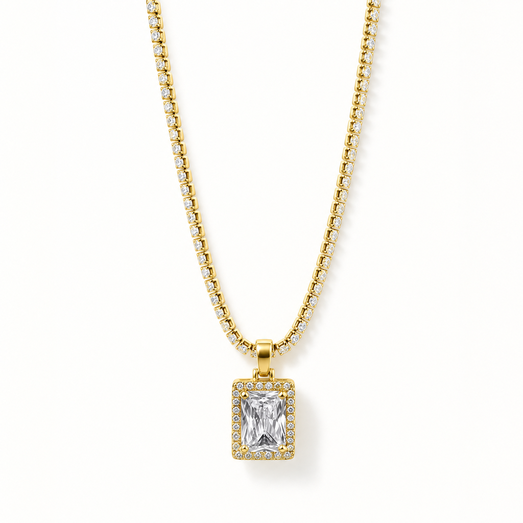 A gold chain necklace with a rectangular emerald-cut clear center stone and a halo of small clear stones, shown on a clean white background.